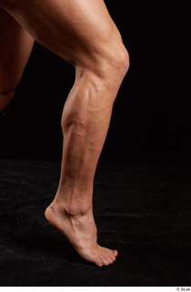 Dave  1 calf flexing nude side view 0007.jpg
